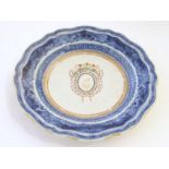 An 18th / 19thC Chinese export blue and white porcelain saucer with blue Fitzhugh borders with