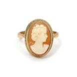 A 9ct gold ring set with cameo. Ring size approx size L Please Note - we do not make reference to