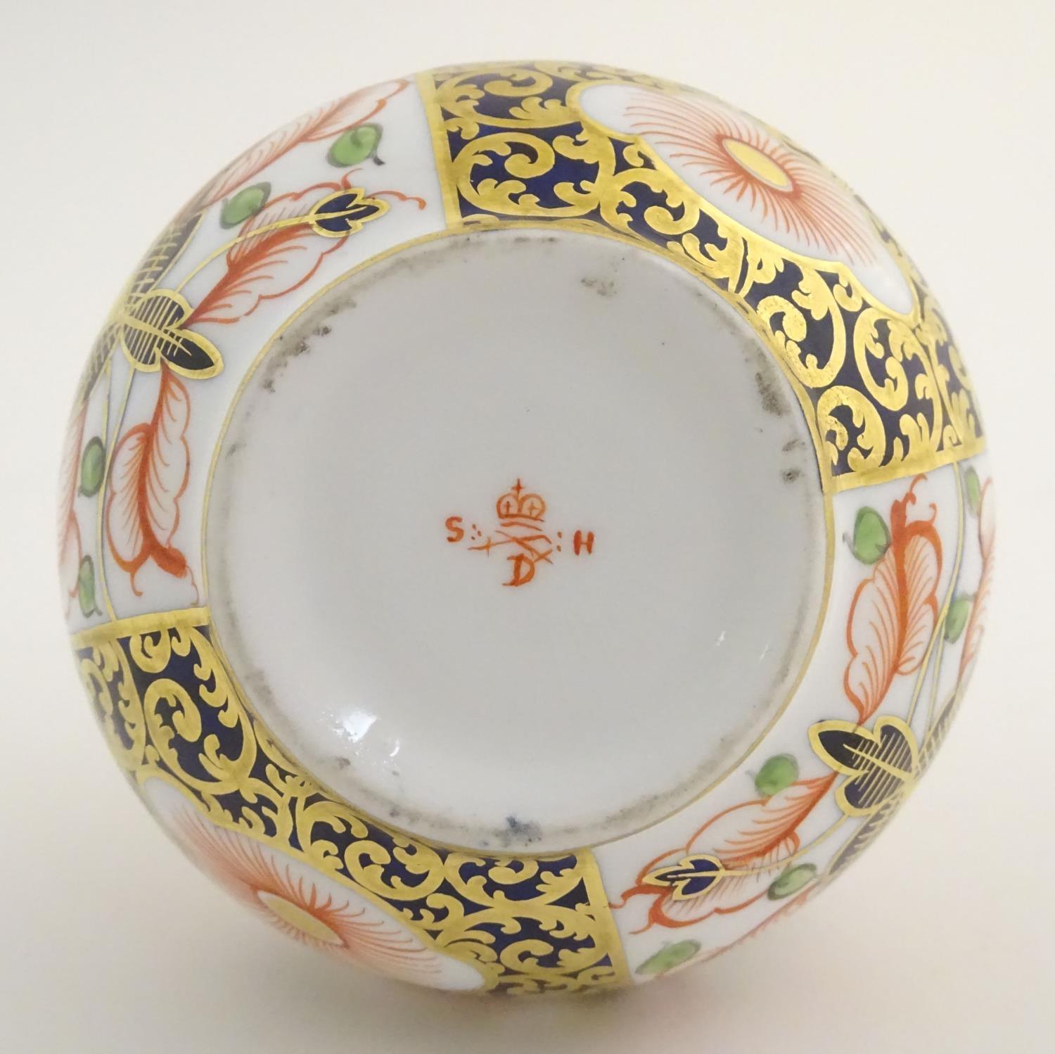 A 19thC Stevenson and Hancock Derby vase decorated with flowers in the Imari palette. Marked - Image 7 of 7