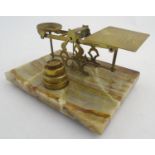 A 19thC set of Sampson Mordan & Co. brass postal scales and weights, upon a marble base. Stamped S