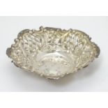 A silver bonbon dish with pierced decoration. Hallmarked Birmingham 1901 maker Henry Matthews.