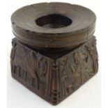 An 18th / 19thC Indian carved wooden stand with a rectangular base and circular top. The base carved