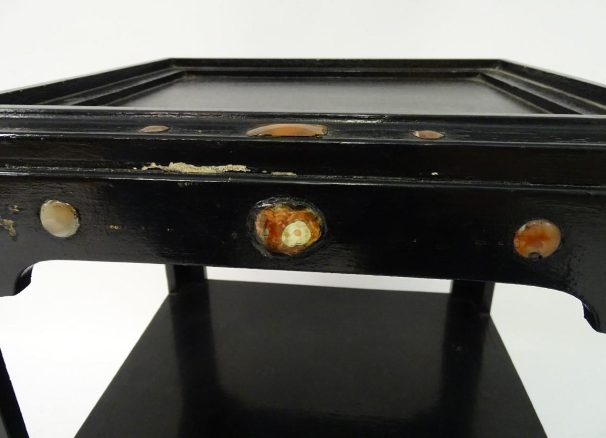 A 20thC ebonised table set with stones and resin gems, the under tier having a decorative - Image 4 of 6