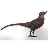 A cold painted bronze model of a pheasant Please Note - we do not make reference to the condition of