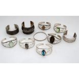 A quantity of white metal bangles Please Note - we do not make reference to the condition of lots