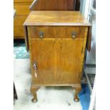 A 1920's / 30's walnut work table with extending top and with drawer and cupboard Please Note - we