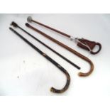2 walking sticks, shooting stick, gun cleaning rod Please Note - we do not make reference to the