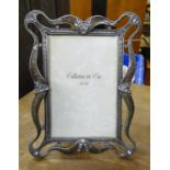 A Collette et Cie white metal easel style photograph frame Please Note - we do not make reference to