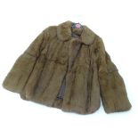 A rabbit fur coat, small Please Note - we do not make reference to the condition of lots within