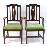 A pair of early / mid 20thC mahogany open armchairs with shaped top rails, pierced back splats and