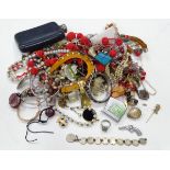 A box of costume jewellery Please Note - we do not make reference to the condition of lots within