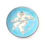 An early 20thC enamelled decorative dish depicting Pierrot holding a balancing stick on a crackle