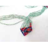 Beadwork necklace Please Note - we do not make reference to the condition of lots within