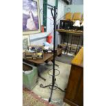 A metal coat stand Please Note - we do not make reference to the condition of lots within