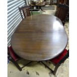 A 20thC dining table Please Note - we do not make reference to the condition of lots within
