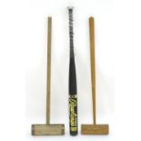A Rawlings Black Gold c405 aluminium alloy softball bat. Together with two wooden croquet mallets,