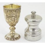 A 20thC pepper mill / grinder, together with a silver plate footed cup. Approx. 3 1/4'' (2) Please