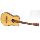 A high spot, 3/4 size, nylon strung guitar Please Note - we do not make reference to the condition