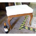 A walnut occasional stool with cabriole legs Please Note - we do not make reference to the condition