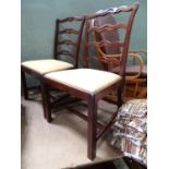 Two mahogany ladder back chairs Please Note - we do not make reference to the condition of lots