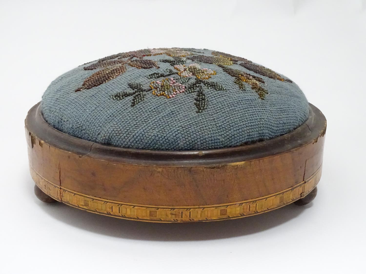 A Victorian walnut footstool of circular form with bead decoration Please Note - we do not make - Image 4 of 4