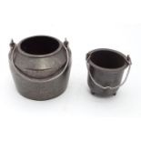Pair of cast iron cooking pots Please Note - we do not make reference to the condition of lots