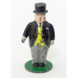 A die-cast ERTL fat controller figure, no. 2630V, from Thomas the Tank Engine & Friends. Approx. 2