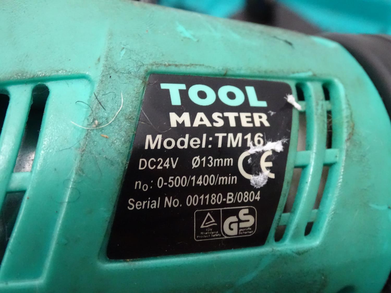 Hammer drill ( Toolmaster model TM16) Please Note - we do not make reference to the condition of - Image 2 of 4