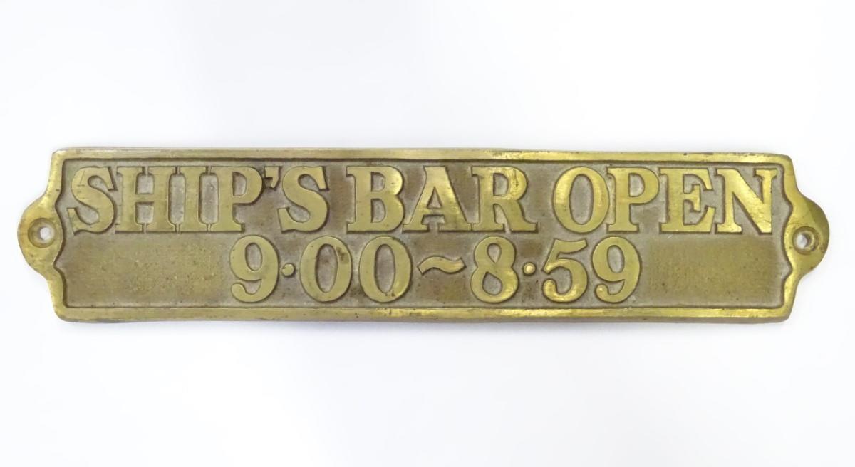 Brass plaque bearing Ships Bar Open 9.00 - 8.59, 9'' long Please Note - we do not make reference