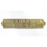 Brass plaque bearing Ships Bar Open 9.00 - 8.59, 9'' long Please Note - we do not make reference