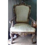 Carved open armchair Please Note - we do not make reference to the condition of lots within