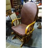 A late 20thC rocking chair Please Note - we do not make reference to the condition of lots within
