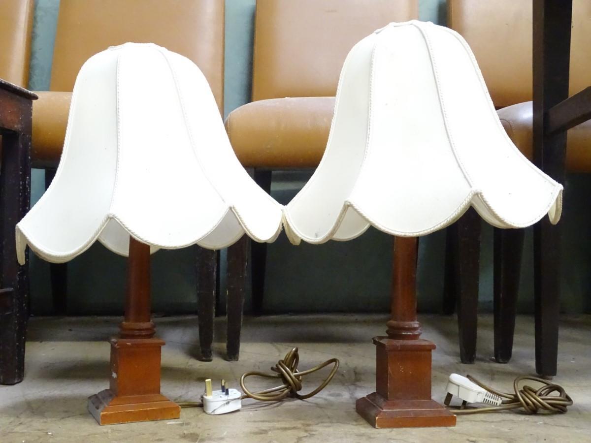 A pair of wooden table lamps with shades Please Note - we do not make reference to the condition