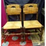 Pair of rush seated open arm chairs Please Note - we do not make reference to the condition of
