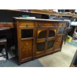 An Edwardian rosewood and inlaid sideboard with glazed section and later cabinet conversion.