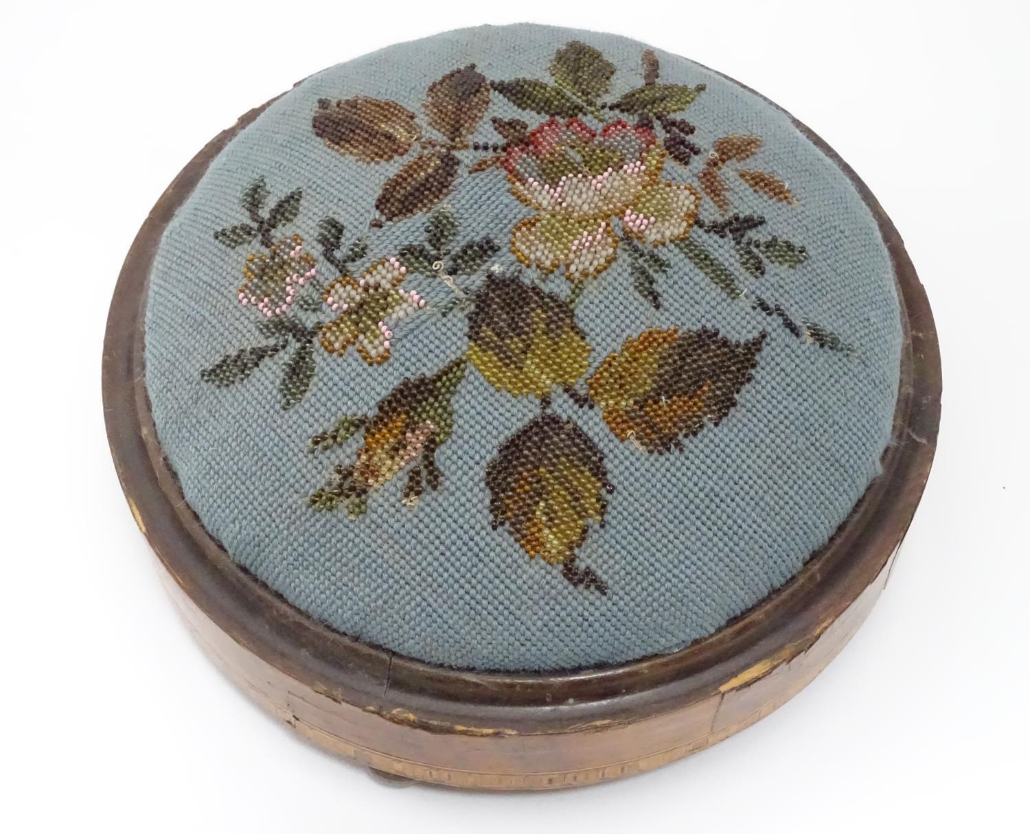 A Victorian walnut footstool of circular form with bead decoration Please Note - we do not make - Image 3 of 4