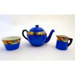 Empire ware tea wares comprising, teapot, sugar bowl and milk jug decorated in the manner of Phoenix