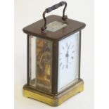 A 20thC 5-glass brass carriage clock. Approx 5 1/2" high overall Please Note - we do not make