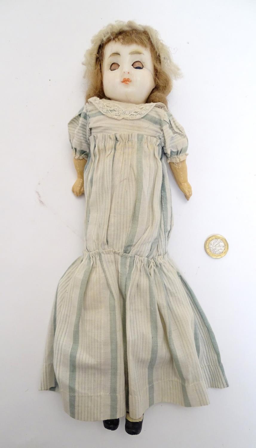 Toy: A wax headed doll with blue eyes, painted features, brown hair, composite forearms and - Image 5 of 9