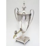 An Old Sheffield Plate urn / samovar with twin handles. Approx. 16" high Please Note - we do not