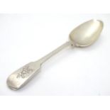 A 19thC Indian silver fiddle pattern dessert spoon by Hamilton & co. 7" long Please Note - we do not