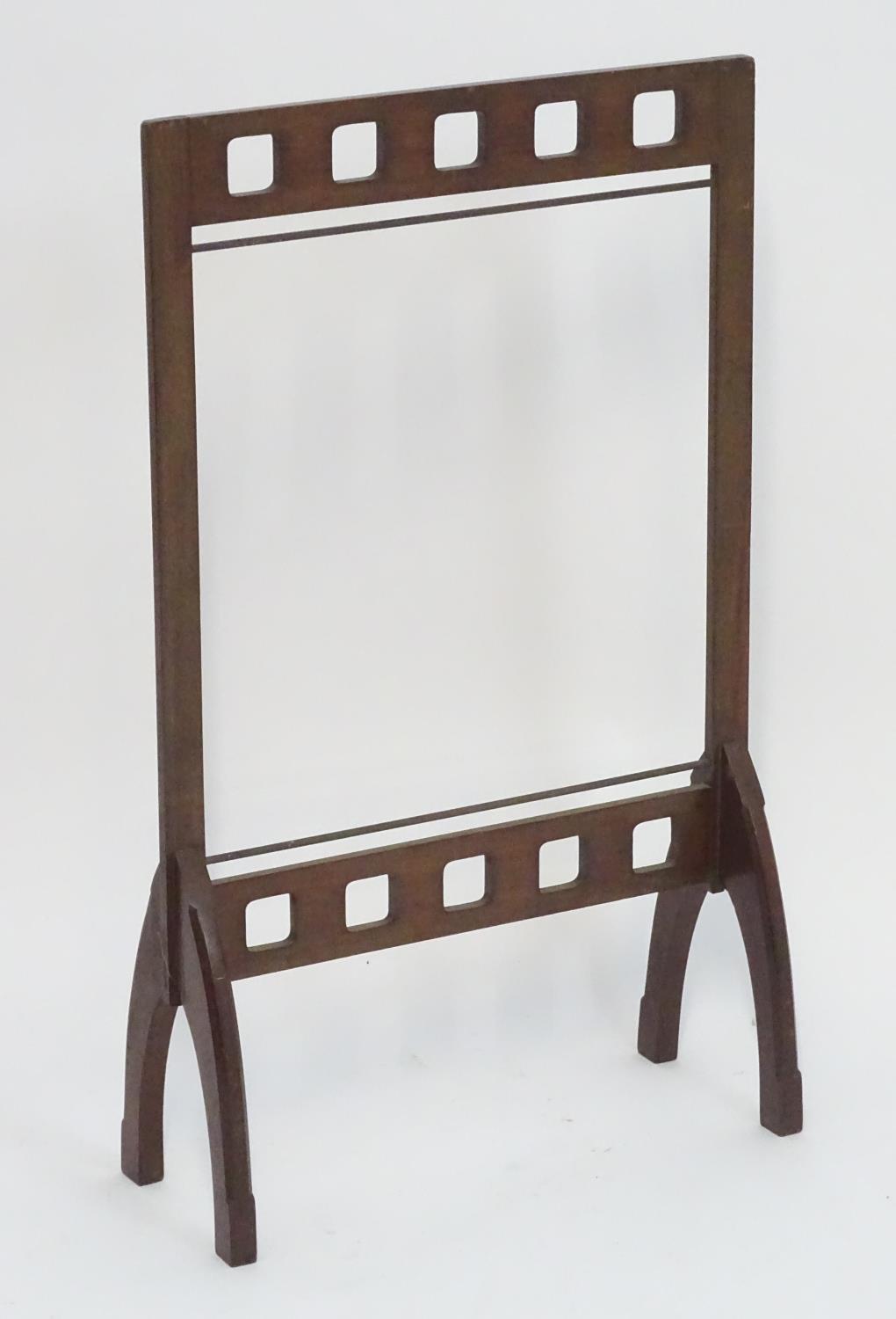 A late 19thC / early 20thC mahogany fire screen frame. In the Glasgow school style. 21" wide x 35" - Image 2 of 11