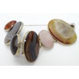 A Scottish bracelet set with various agate specimen cabochon with white metal mounts. Please