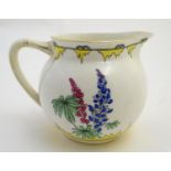 An Art Deco Adderleys jug in the pattern Lupin, with stylised flower decoration. Marked under