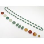 A necklace of pearls and jade beads together with assorted unstrung jade beads Please Note - we do