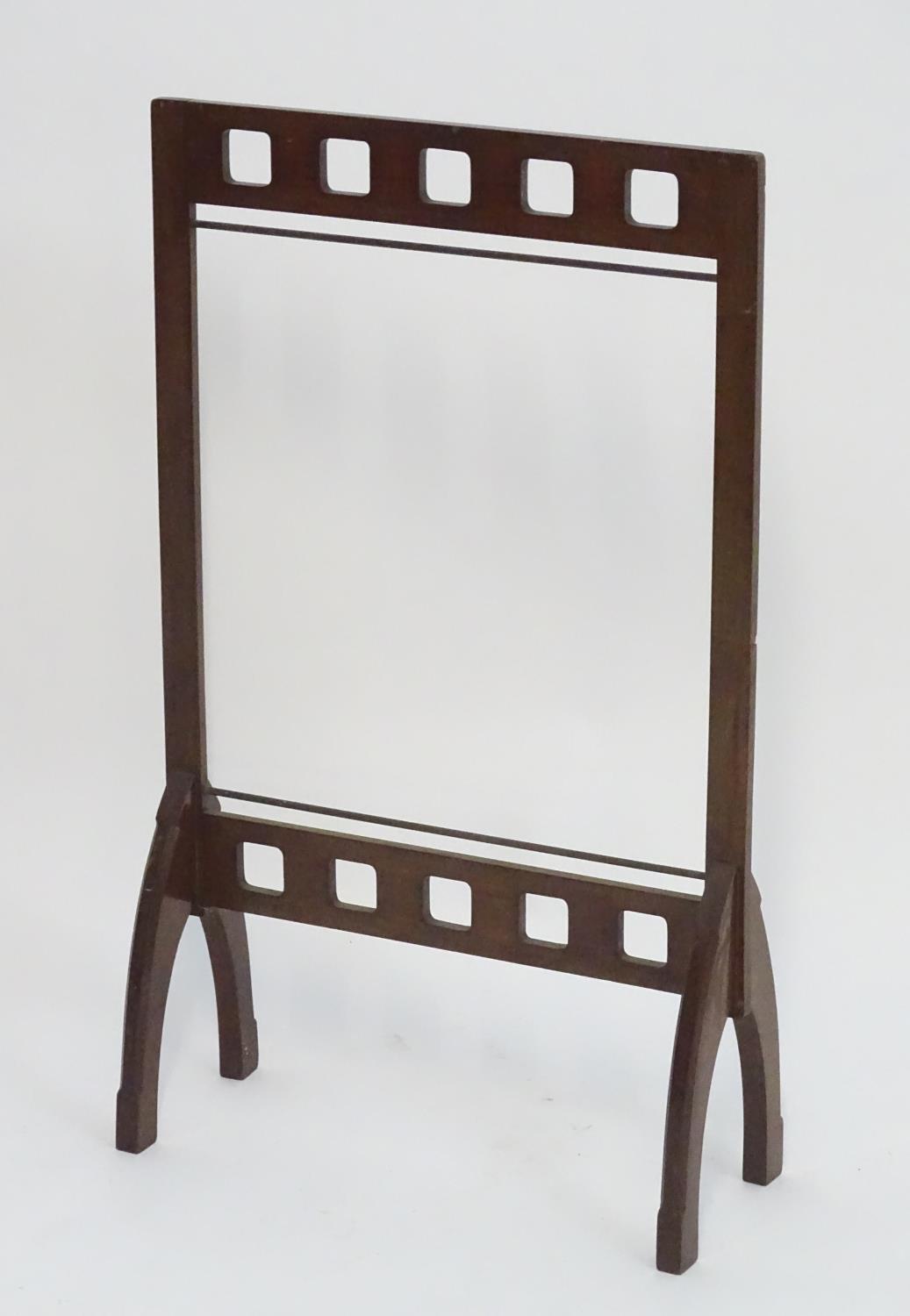 A late 19thC / early 20thC mahogany fire screen frame. In the Glasgow school style. 21" wide x 35" - Image 4 of 11