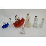 Seven Royal Doulton figurines modelled as ladies, to include Elaine, a lady with a fan in a red
