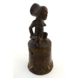 Ethnographic / Native / Tribal: A carved African wooden bell / vessel with geometric detail