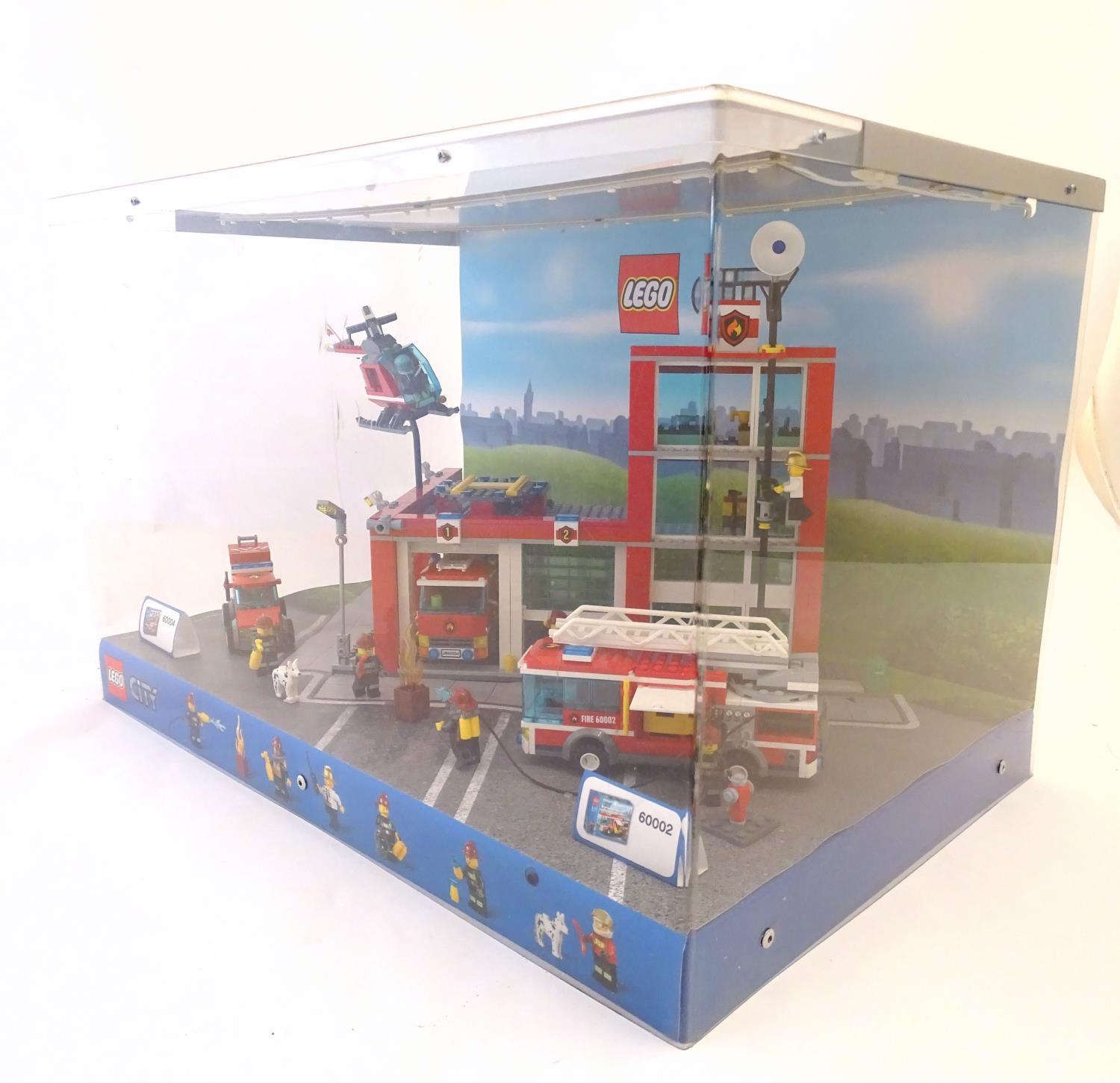Toy: A Lego City shop display unit featuring a fire station, model no. 60004 and a fire truck, model - Image 4 of 11