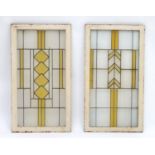 Two Art Deco stained glass window panes / panels with geometric and chevron detail. Approx. 35" x 17